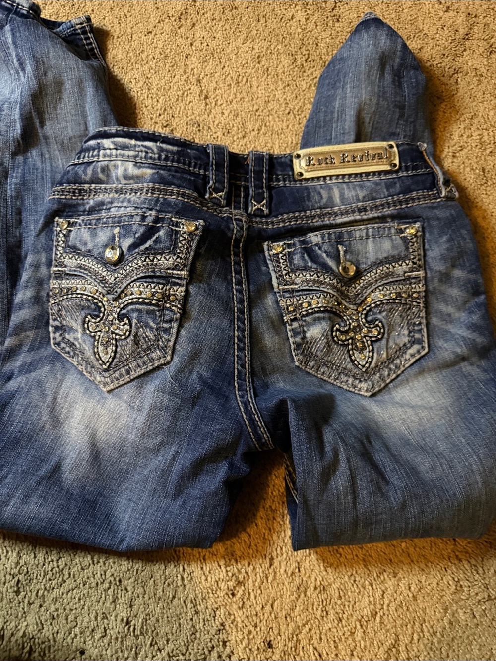 Rock Revival Distressed Blue Denim Jeans with Embellished Back Pockets